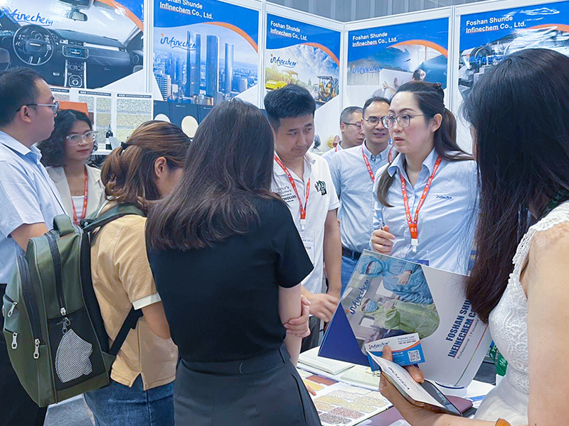 Vietnam Coating Exhibition 2023, Salemen Talking with visitors, Booth