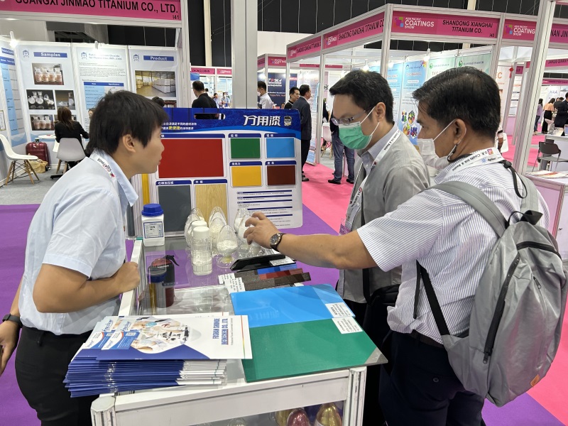 Booth, Chemical Raw Material Samples and Brochures, Salesman Talking to Visitors